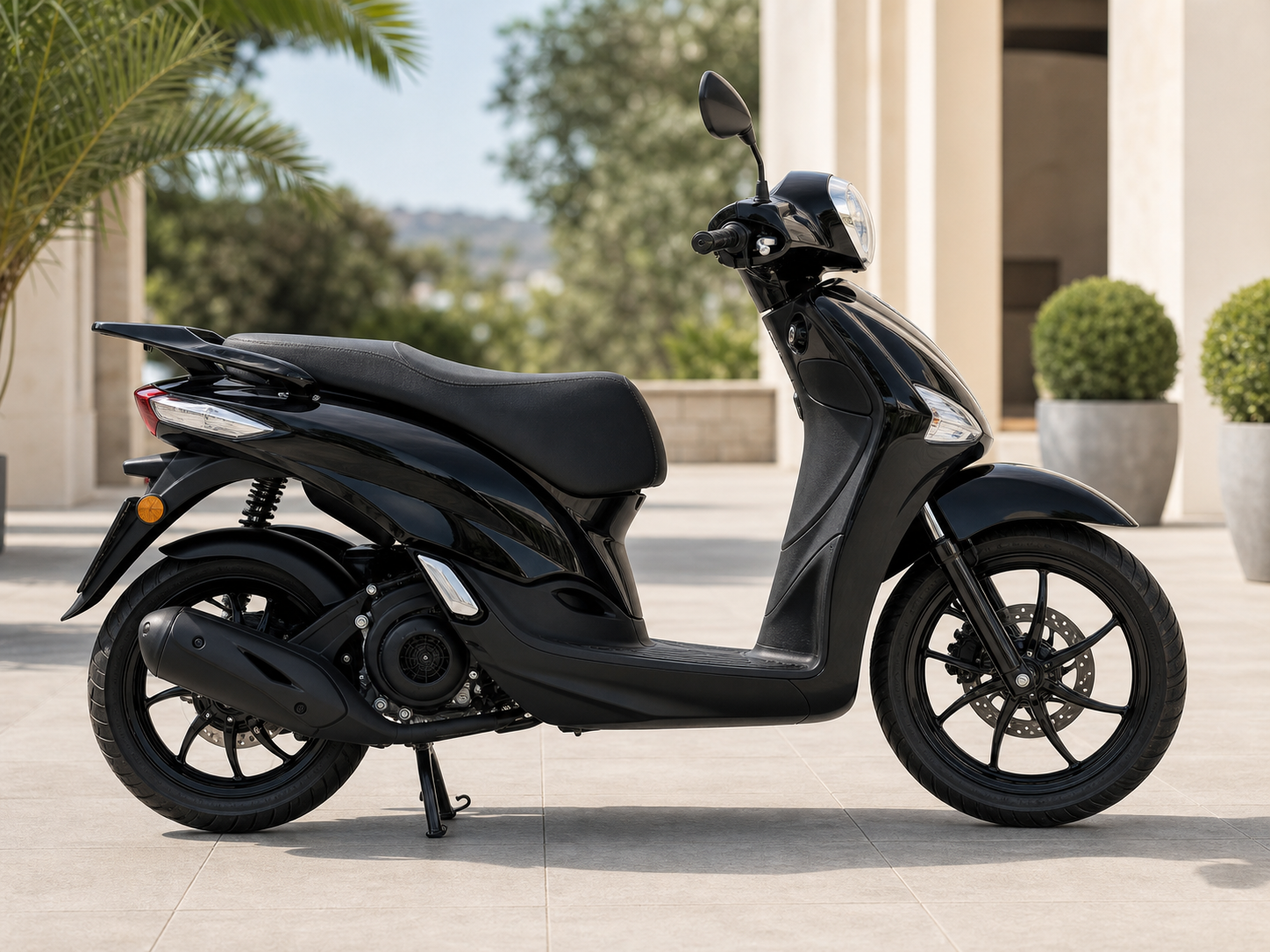 Side view of a black 2026 Piaggio Liberty 125 rental scooter